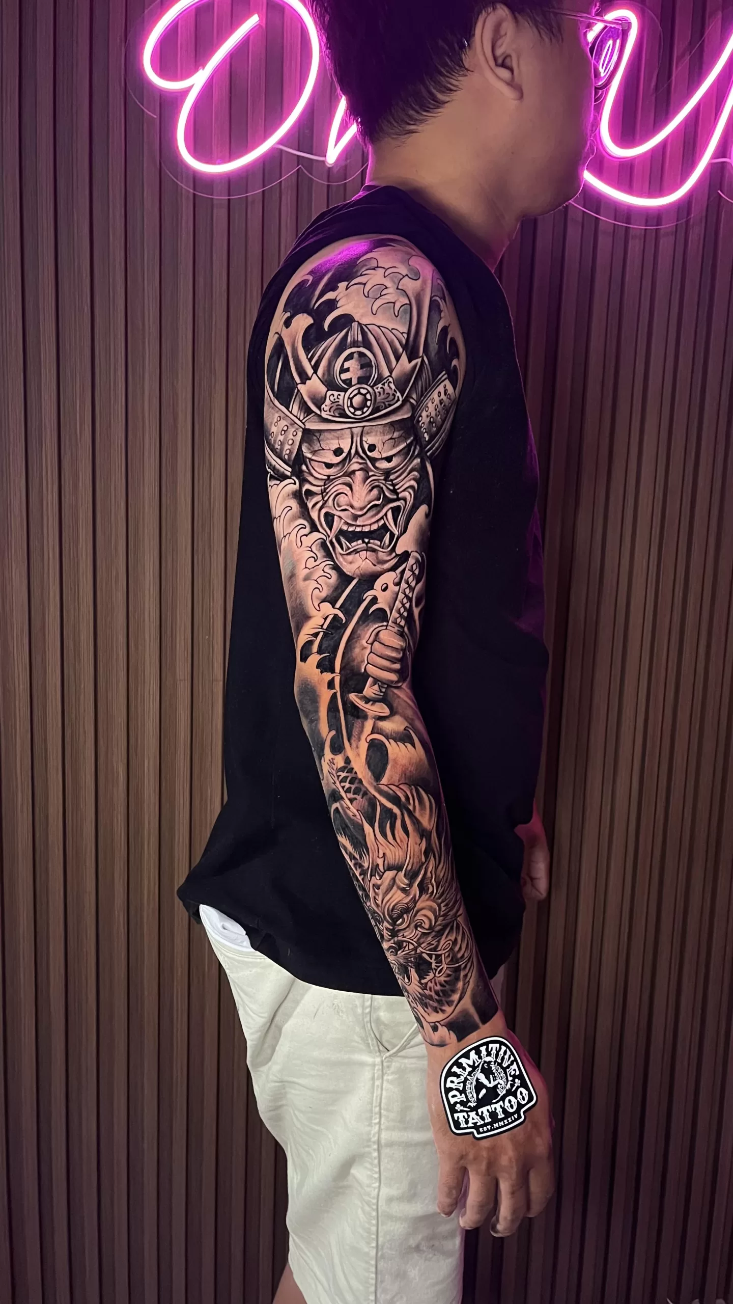Japanese samurai men's arm sleeve tattoo by Primitive Tattoo Bali - traditional warrior design with detailed shading Seminyak