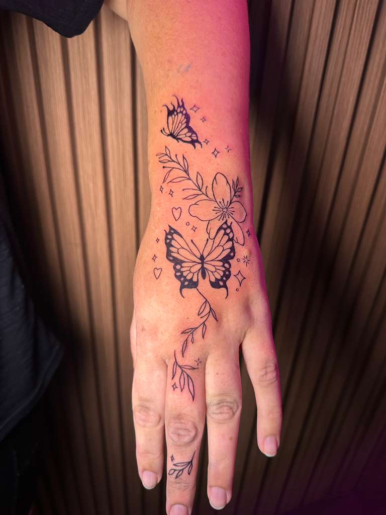 Butterfly and flower tattoo design