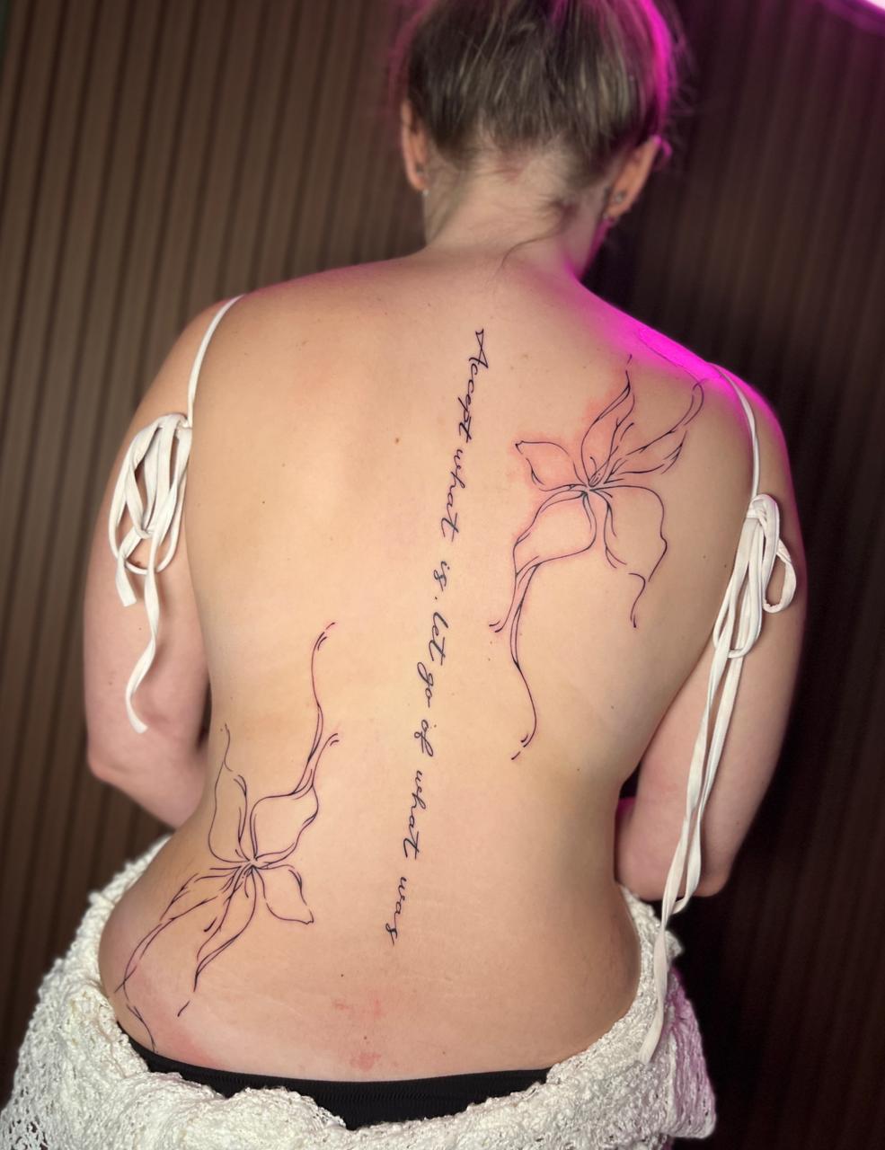 Tattooed back with floral design